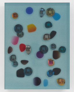 Jim Lambie December 1972, Kaleidoscopic Pearlescent Blue, 2026; resin, sunglasses lens, birch plywood, paint; 60 x 45 x 5 cm; enquire