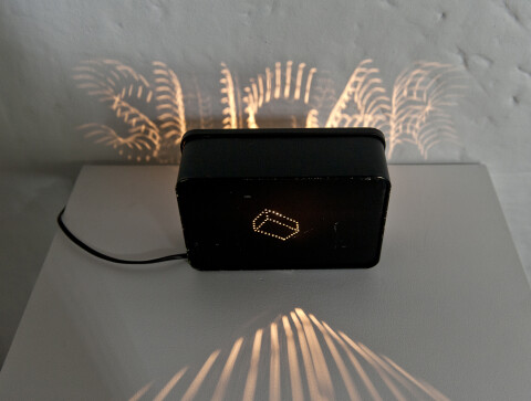 Bill Culbert Sugar Box, 1992; metal box, incandescent light globe; 13 x 19.5 x 7 cm; enquire