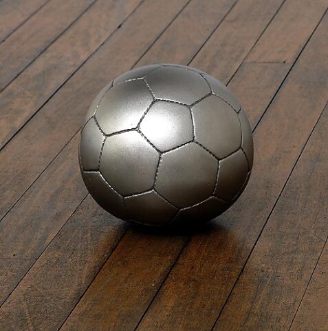 James Angus Soccerball dropped from 35,000 feet, 2006; from the series Exhibited at Art 38 Basel, Switzerland, 2007; stainless steel; 20 x 20 x 19.5 cm; Edition of 5 + AP 2; enquire