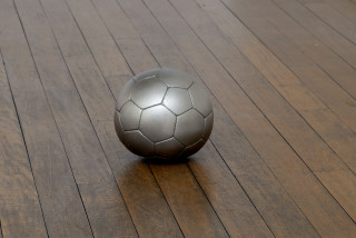 James Angus Soccerball dropped from 35,000 feet, 2006; from the series Exhibited at Art 38 Basel, Switzerland, 2007; stainless steel; 20 x 20 x 19.5 cm; Edition of 5 + AP 2; enquire