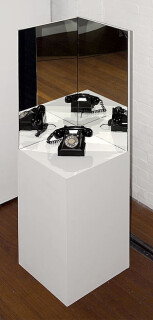 Robyn Backen A Very Enchanting Thing, 2007; mirror, bakelite telephone, sound (Julius Sumner Miller "Why It Is So" program no. 3N99955, 'Physics of Optics and Reflection'); 180 x 47 x 47 cm; duration: 5 mins; Enquire