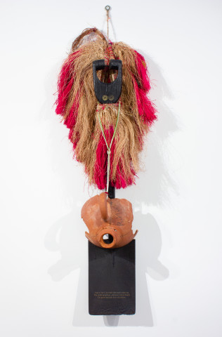 Newell Harry Untitled (Bearded Black Virgin with Ancestral Pig), 2011-12; Trobriand Island women’s dance skirt, etched spade, boot polish, Japanese Yen, ceramic Matka (Madhya Pradeshi water vessel), glass beads, twine.

; 130 x 43 x 20 cm; enquire