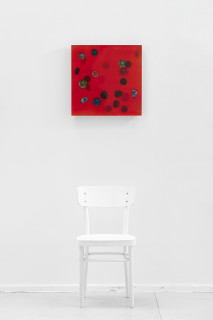 Jim Lambie July 2002, Coral red unveils across a silken sky, 2026; resin, sunglasses lens, birch plywood, paint; 51 x 51 x 5 cm; enquire