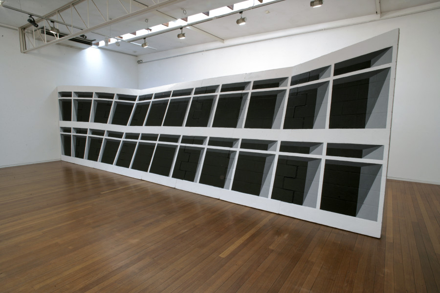 Callum Morton Monument #23: Slump, 2009; polyurethane, epoxy resin, fiberglass, sand cement, timbre, acrylic paint; 260 × 960 × 270cm; Exhibition view, Wall To Wall, Roslyn Oxley9 Gallery (26 February – 21 March 2009)