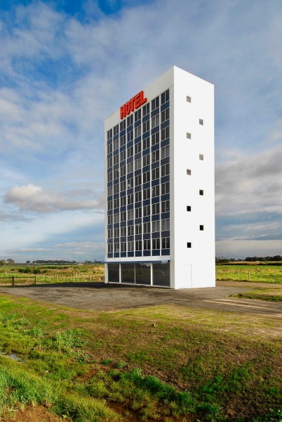 Callum Morton Hotel, 2008, concrete, steel, glass, solar-powered lightboxes, 2000 × 1200 × 500cm; Installation view, Connect East Commission for Eastlink freeway, Nunawading to Frankston, Melbourne, 2008