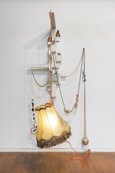 Mikala Dwyer,&nbsp;Lamp for Burnt Bridges, 2010 – 2017, wood, metal, fabric, clay, glass, leather, plant matter, crystal, porcelain, light, 200 x 100 x 90 cm