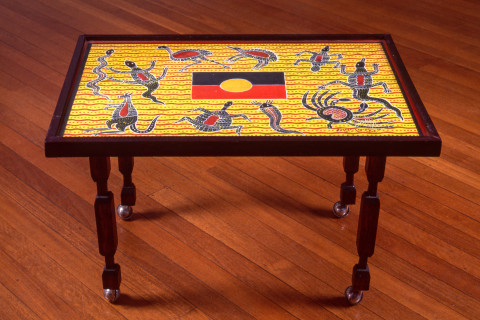 Robert Campbell Jnr Abo, Tucker and Flag, 1987; coffee table: acrylic, wood and glass; 49 x 92 x 52 cm; enquire
