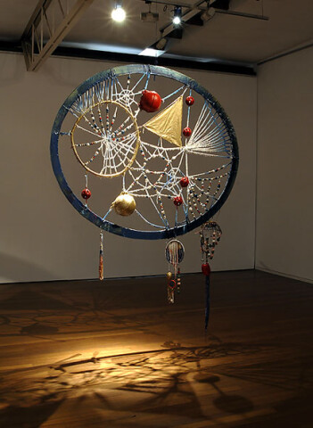 Rohan Wealleans Blood Crystal Catcher, 2006; an intricate system of wood, string, rope, ceramic beads, fish buoys, baby rattles and paint with steel stand; 278 x 202 x 20 cm; enquire
