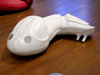Patricia Piccinini 6. Cyclepups: Angel, 2005; fibreglass, automotive paint, leather and stainless steel; 40 x 110 x 50 cm; Enquire