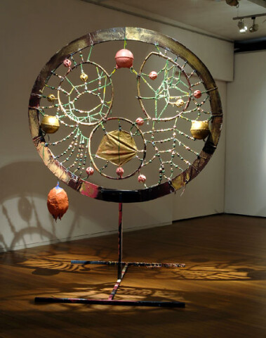 Rohan Wealleans For the Spirits of the Bust, 2006; an intricate system of wood, string, rope, ceramic beads, fish buoys, baby rattles and paint with steel stand; 300 x 155 x 28 cm; enquire
