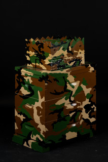 Fiona Hall The Barbarians at the Gate (detail), 2010-2026; wooden beehives, wood and metal architectural models, plastic 'action' dolls, paint; installation dimensions variable; enquire