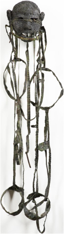 Fiona Hall Conscript, 2019; military garment, charcoal, ochre, nails; 101 x 25 x 25 cm; enquire