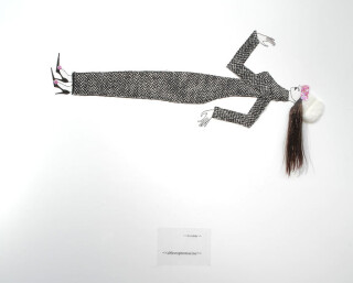 Jacqueline Fraser  , 2004; nylon hair, faux fur, French rosette lace, Italian wool suiting, vylene stiffening; 170 x 85 x 15 cm; enquire