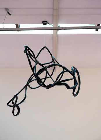 Jim Lambie Other Planes of There, 2015; wire, bike inner tube, mirror ball motor; enquire