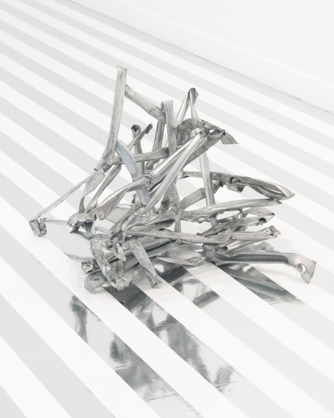 Jim Lambie Crushed Barrier (Cool Breeze), 2026; crushed metal barrier and steel fencing wire; 52 x 80 x 60 cm; more info; enquire