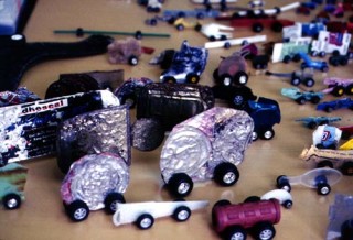 Simryn Gill , 1999-00; from the series Roadkill; Mixed things found on roads, toy wheels; Variable; enquire