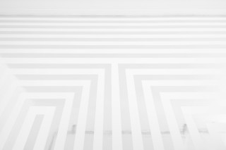 Jim Lambie Zobop Broadband (White and
Chrome), 2025; White and chrome vinyl tape; dimensions variable; Edition of 3 + 1 AP; enquire