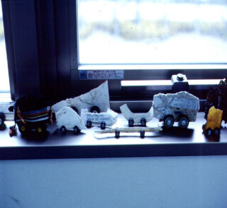 Simryn Gill , 1999-00; from the series Roadkill; Mixed things found on roads, toy wheels; Variable; enquire