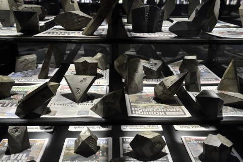 Fiona Hall Untitled, 2014-15; 94 bronze crystals, 48 newspapers; Dimensions variable; enquire