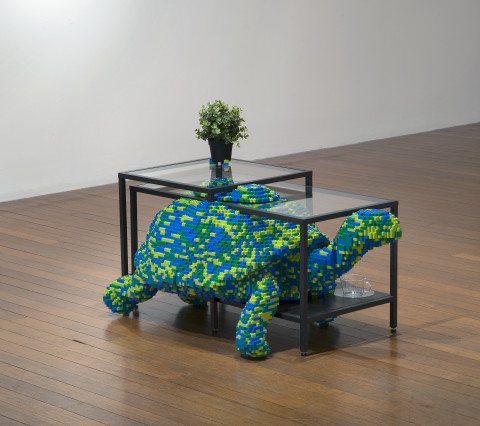 Claire Healy and Sean Cordeiro Upstairs Living Room – Tortoise, 2014; Lego, Ikea coffee table and plant; 75 x 109 x 62 cm; enquire
