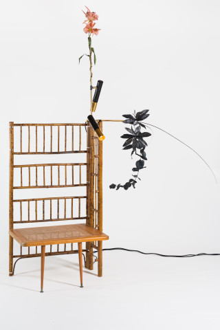 Sarah Contos Dressing room, 2019; repurposed cane, light fixtures, fake flowers; 220 x 185 x 77 cm; Enquire
