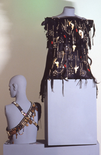 Left: Ha Ha Ha, 1984, belt, large leather, stud, metal, fetish belt; Small leather and metal belt, 1984 Right: Connie the Barbarian, 1984, leather, hair, chain, studs and bone tabbard