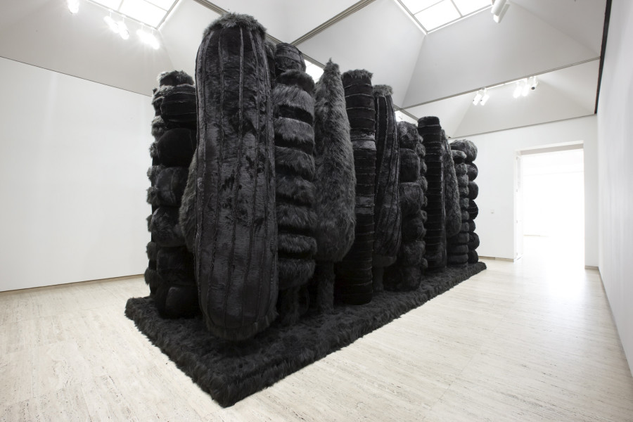 Installation view, Kathy Temin The Memorial Project: Black Wall (section 2), 2015, wood, steel, synthetic fur and filling, 240 x 800 x 40; Image courtesy of the Museum of Contemporary Art Australia