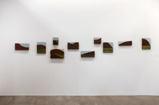 Rosalie Gascoigne Skylark, 1994-95; sawn wood on wood; 64 x 418 cm; 10 panels; enquire