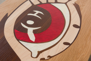 Del Kathryn Barton eye bench (detail), 2022; American White Oak with Cambia Ash and Rock Maple inlay, Abalone Green, Red, Blue and White Fresh Water mother of pearl inlay, brass, ink and watercolour on paper; 45 x 240 x 50 cm; 40kg; enquire