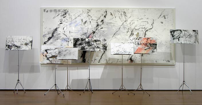 John Wolseley 1. The harmonic patterns of Mallee birdsong - Finch Eagle and Bush Curlew, 2004; carbonised wood, watercolour on paper, and music stands; installation, overall approx. 200 x 350 x 150 cm, eight parts (i) 143 x 348 cm; (ii) 37 x 72 cm; (iii) 57 x 76.5 cm; (iv) 30.5 x 54.4 cm; (v) 35 x 84.5 cm; (vi) 31 x 49 cm; (vii) 46 x 67 cm; (viii) 41 x 66.5 cm (paper); enquire