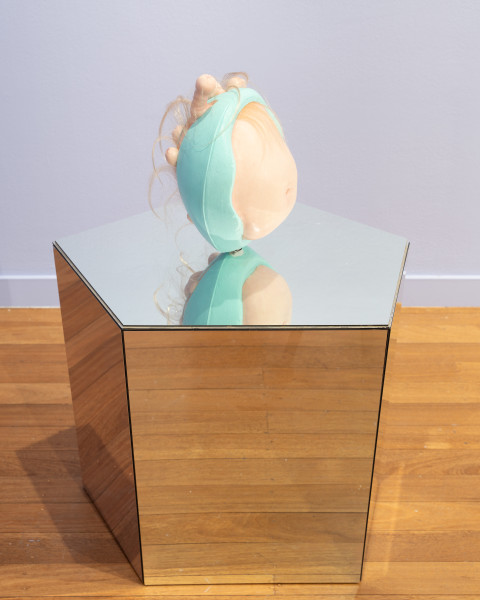 Patricia Piccinini Egg Head in Motion, 2025; silicone, polyurethane, hair, stainless steel, microcontroller, motor, mirrored plinth; 95 x 50 x 61 cm; From a suite of 3 colour variations; enquire