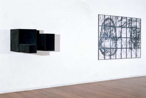 Mike Parr Raft of the Eye of God, 1990; wall relief (counter relief): acrylic filler & charring on particle board; 32 framed A4 size laser copies; 60 x 161 x 119 cm; two parts: 60 x 161 x 119 cm & 172 x 248 cm; enquire