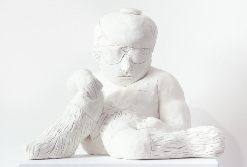 Linda Marrinon Reclining Figure with Boots, 1994; stoneware; 25 cms high; enquire