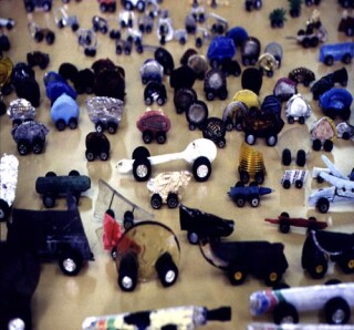 Simryn Gill , 1999-00; from the series Roadkill; Mixed things found on roads, toy wheels; Variable; enquire