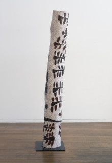Nyapanyapa Yunupingu Larrakitj 3, 2014; 4673C; natural earth pigments on hollow log; 188 x 22 x 22 cm; Enquire