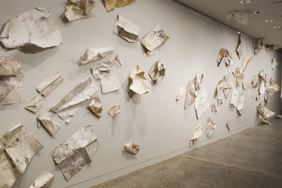 John Wolseley Ventifacts from Mallee Scrub after Fire, 2007-12; carbonised wood, natural ochres, watercolour on rag paper, dimensions variable; Installation view, 18th Biennale of Sydney, Art Gallery of New South Wales (27 June – 16 September 2012); Photo: Ben Symons